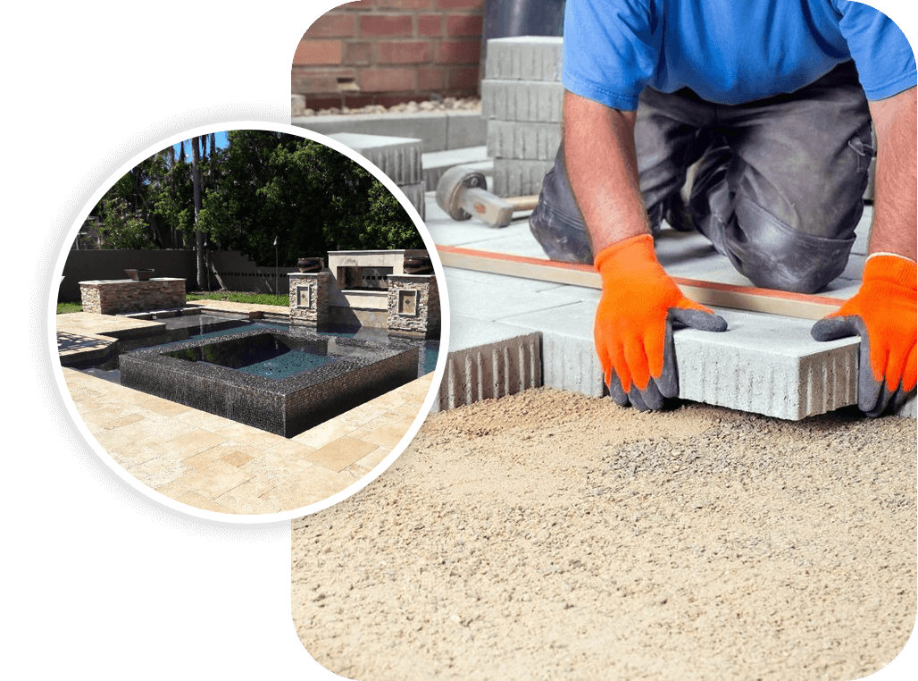 Hands of a Builder Laying New Paving Stones